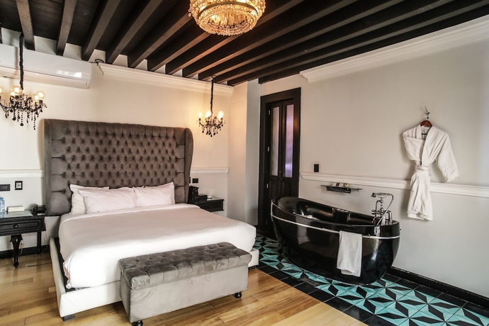 Imagen de la habitación del Boutique Quinta Esencia. Foto 10