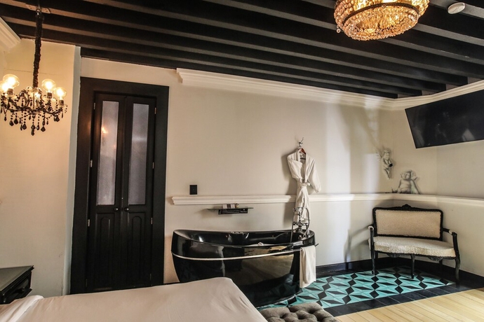 Imagen de la habitación del Boutique Quinta Esencia. Foto 11