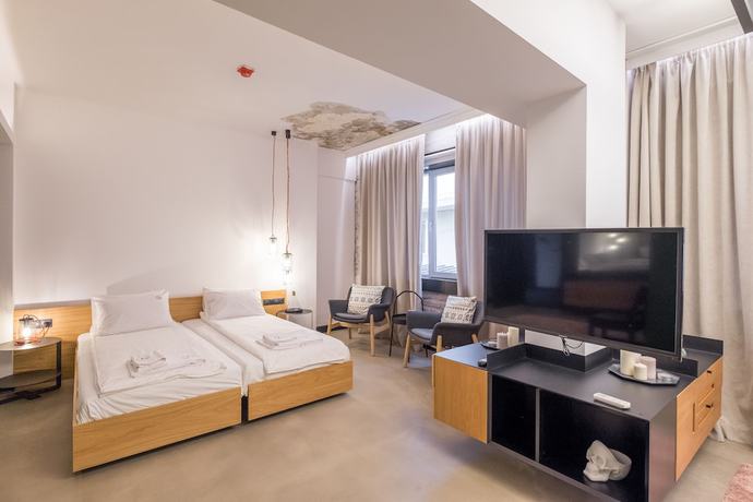 Imagen de la habitación del Boutique R34. Foto 13