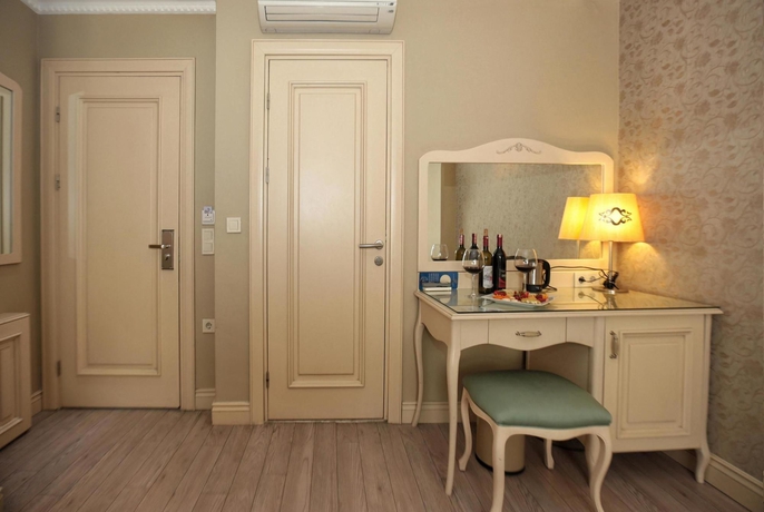 Imagen de la habitación del Boutique Raymond Hotel. Foto 5