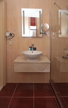 Imagen de la habitación del Boutique Raymond Hotel. Foto 7