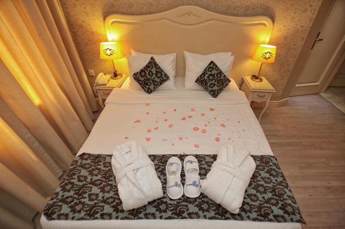 Imagen de la habitación del Boutique Raymond Hotel. Foto 8