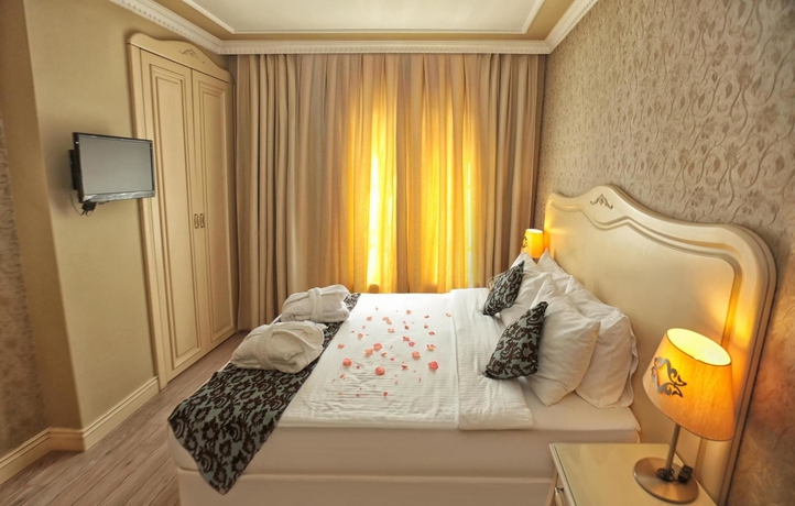 Imagen de la habitación del Boutique Raymond Hotel. Foto 10