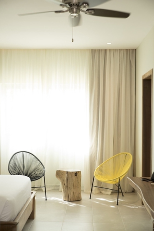 Imagen de la habitación del Boutique Saman Hotel y Residences. Foto 10