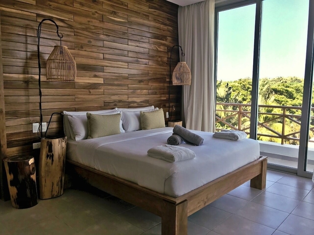 Imagen de la habitación del Boutique Saman Hotel y Residences. Foto 19