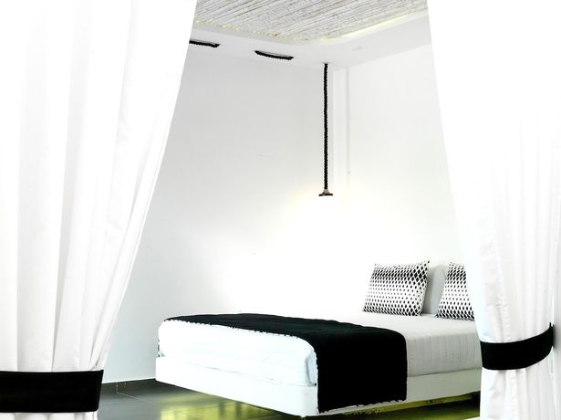 Imagen de la habitación del Boutique San Marino Suites by Calm Collection. Foto 6