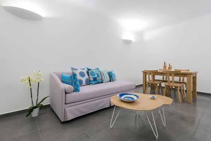 Imagen de la habitación del Boutique San Marino Suites by Calm Collection. Foto 10