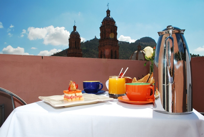 Imagen de los exteriores del Boutique Santa Rita Hotel Del Arte. Foto 6