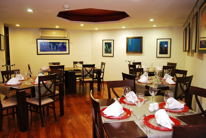 Imagen del bar/restaurante del Boutique Santa Rita Hotel Del Arte. Foto 3