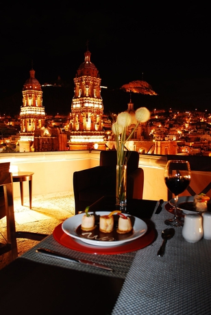 Imagen del bar/restaurante del Boutique Santa Rita Hotel Del Arte. Foto 4