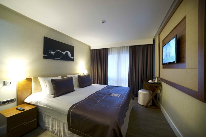 Imagen de la habitación del Boutique Taba Luxury Suites. Foto 12