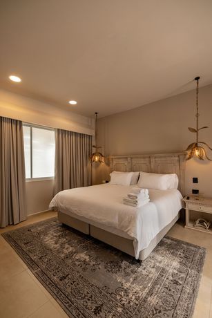 Imagen de la habitación del Boutique Tau House. Foto 3