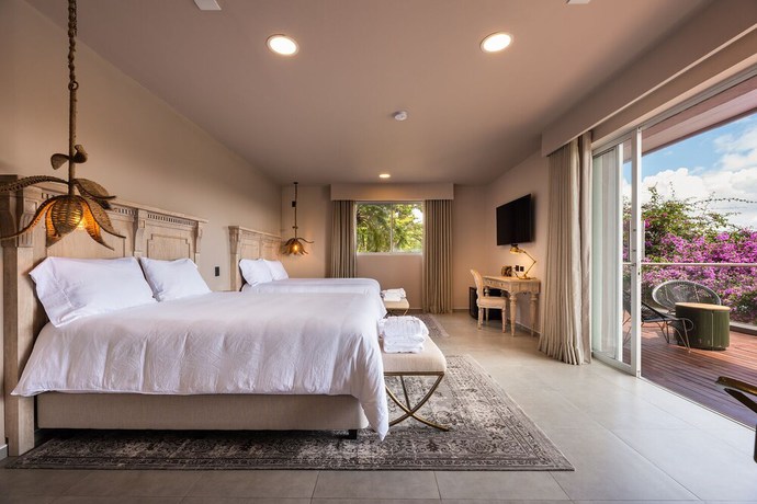 Imagen de la habitación del Boutique Tau House. Foto 6