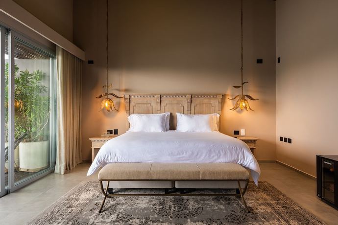 Imagen de la habitación del Boutique Tau House. Foto 9