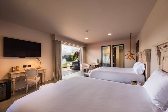 Imagen de la habitación del Boutique Tau House. Foto 10