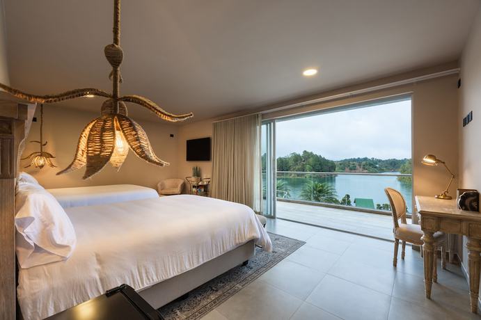 Imagen de la habitación del Boutique Tau House. Foto 15