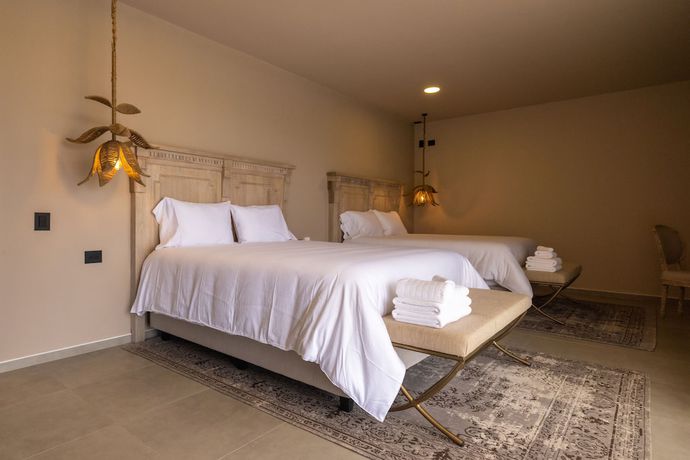 Imagen de la habitación del Boutique Tau House. Foto 16