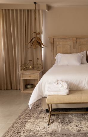 Imagen de la habitación del Boutique Tau House. Foto 17