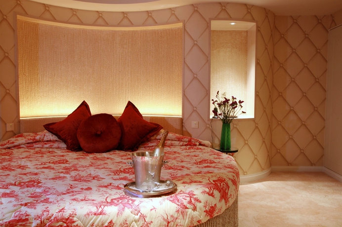 Imagen de la habitación del Boutique The Luxe Manor. Foto 11