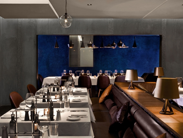 Imagen del bar/restaurante del Boutique The Opposite House. Foto 3