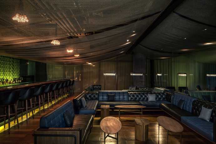 Imagen del bar/restaurante del Boutique The Opposite House. Foto 8