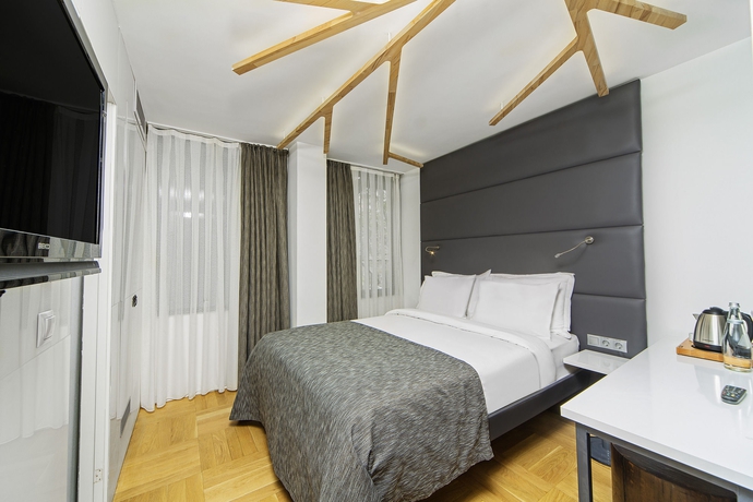Imagen de la habitación del Boutique The Purl Hotel. Foto 5