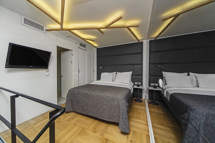 Imagen de la habitación del Boutique The Purl Hotel. Foto 8