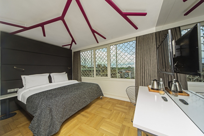 Imagen de la habitación del Boutique The Purl Hotel. Foto 10