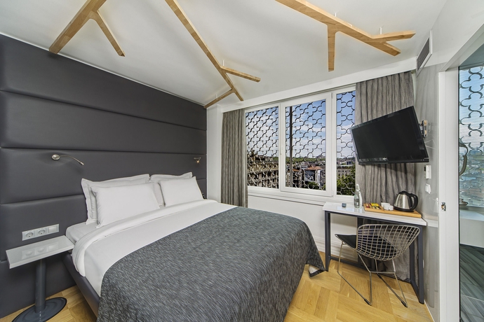 Imagen de la habitación del Boutique The Purl Hotel. Foto 12