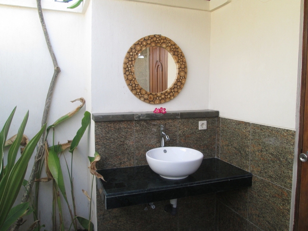 Imagen de la habitación del Boutique The Tanis Beach Resort Nusa Lembongan. Foto 3