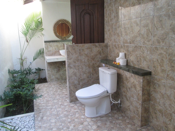 Imagen de la habitación del Boutique The Tanis Beach Resort Nusa Lembongan. Foto 8