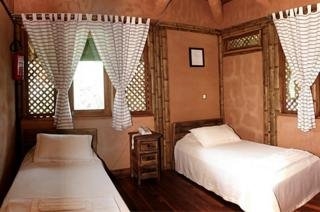 Imagen de la habitación del Boutique Timarai Bambu Resort. Foto 3