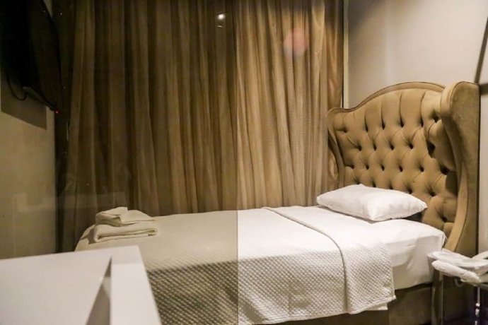 Imagen de la habitación del Boutique Upper House Hotel. Foto 9