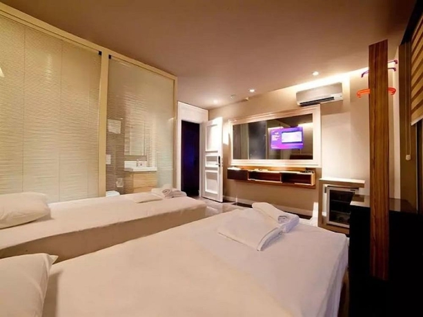 Imagen de la habitación del Boutique Upper House Hotel. Foto 11