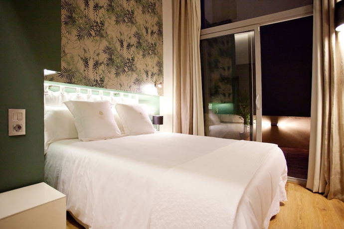 Imagen de la habitación del Boutique Vasanta. Foto 9