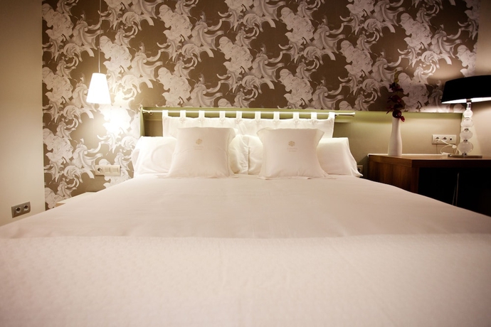 Imagen de la habitación del Boutique Vasanta. Foto 10