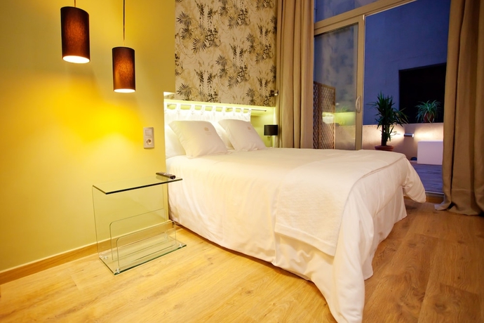 Imagen de la habitación del Boutique Vasanta. Foto 12