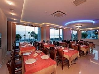 Imagen del bar/restaurante del Boutique Venessa Beach Hotel. Foto 8