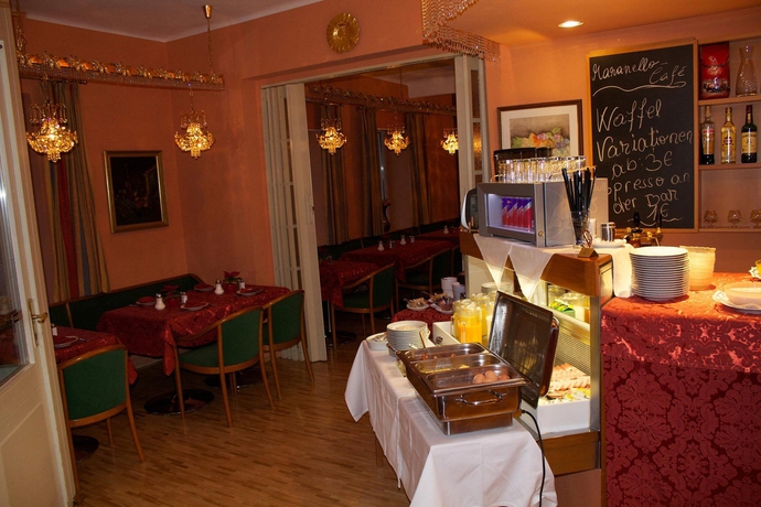 Imagen del bar/restaurante del Boutique Vier Jahreszeiten, Salzburgo. Foto 1