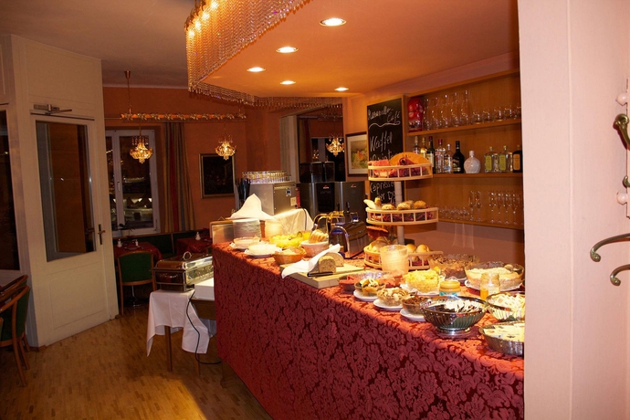 Imagen del bar/restaurante del Boutique Vier Jahreszeiten, Salzburgo. Foto 3