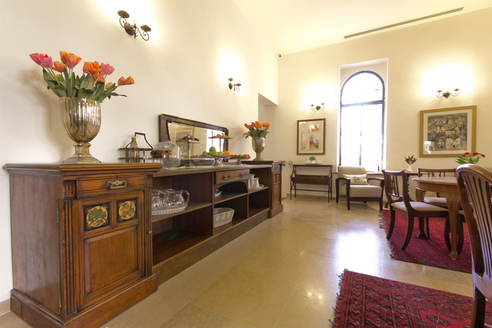 Imagen del bar/restaurante del Boutique Villa Ba'moshava - A Member Of Brown Hotels. Foto 2