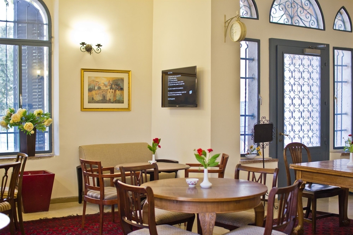 Imagen del bar/restaurante del Boutique Villa Ba'moshava - A Member Of Brown Hotels. Foto 3