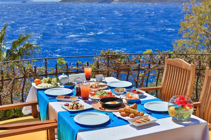 Imagen del bar/restaurante del Boutique Villa Tamara. Foto 3