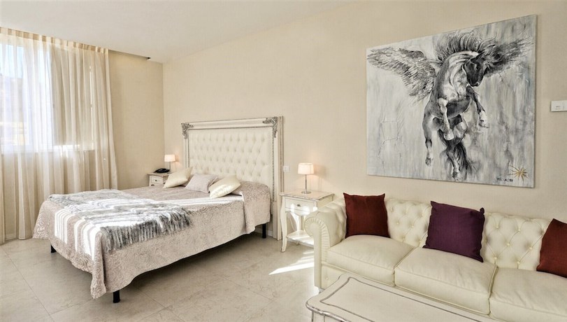 Imagen de la habitación del Boutique Villa del Sole Siena. Foto 2