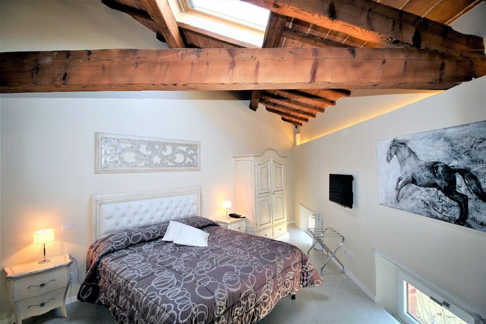 Imagen de la habitación del Boutique Villa del Sole Siena. Foto 4