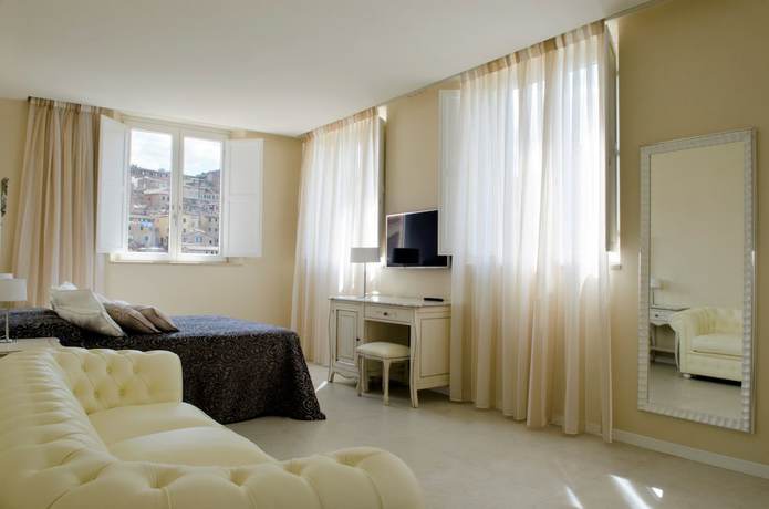 Imagen de la habitación del Boutique Villa del Sole Siena. Foto 6