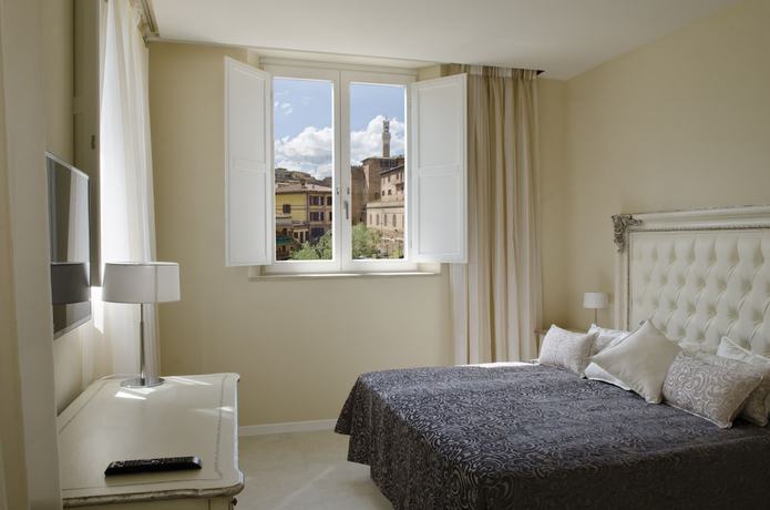 Imagen de la habitación del Boutique Villa del Sole Siena. Foto 8