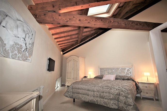 Imagen de la habitación del Boutique Villa del Sole Siena. Foto 14