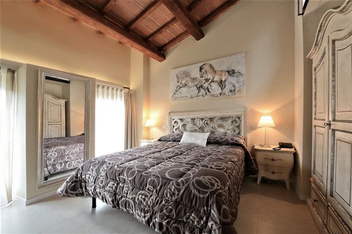 Imagen de la habitación del Boutique Villa del Sole Siena. Foto 15