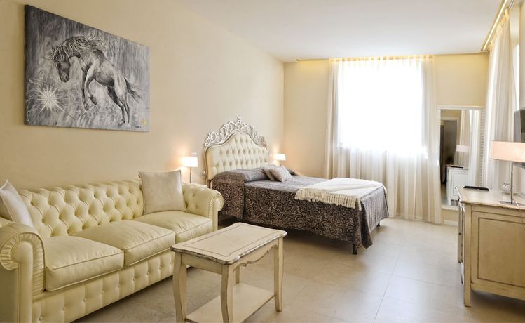 Imagen de la habitación del Boutique Villa del Sole Siena. Foto 16